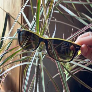 Tortoise and yellow Ray Ban wayfarers